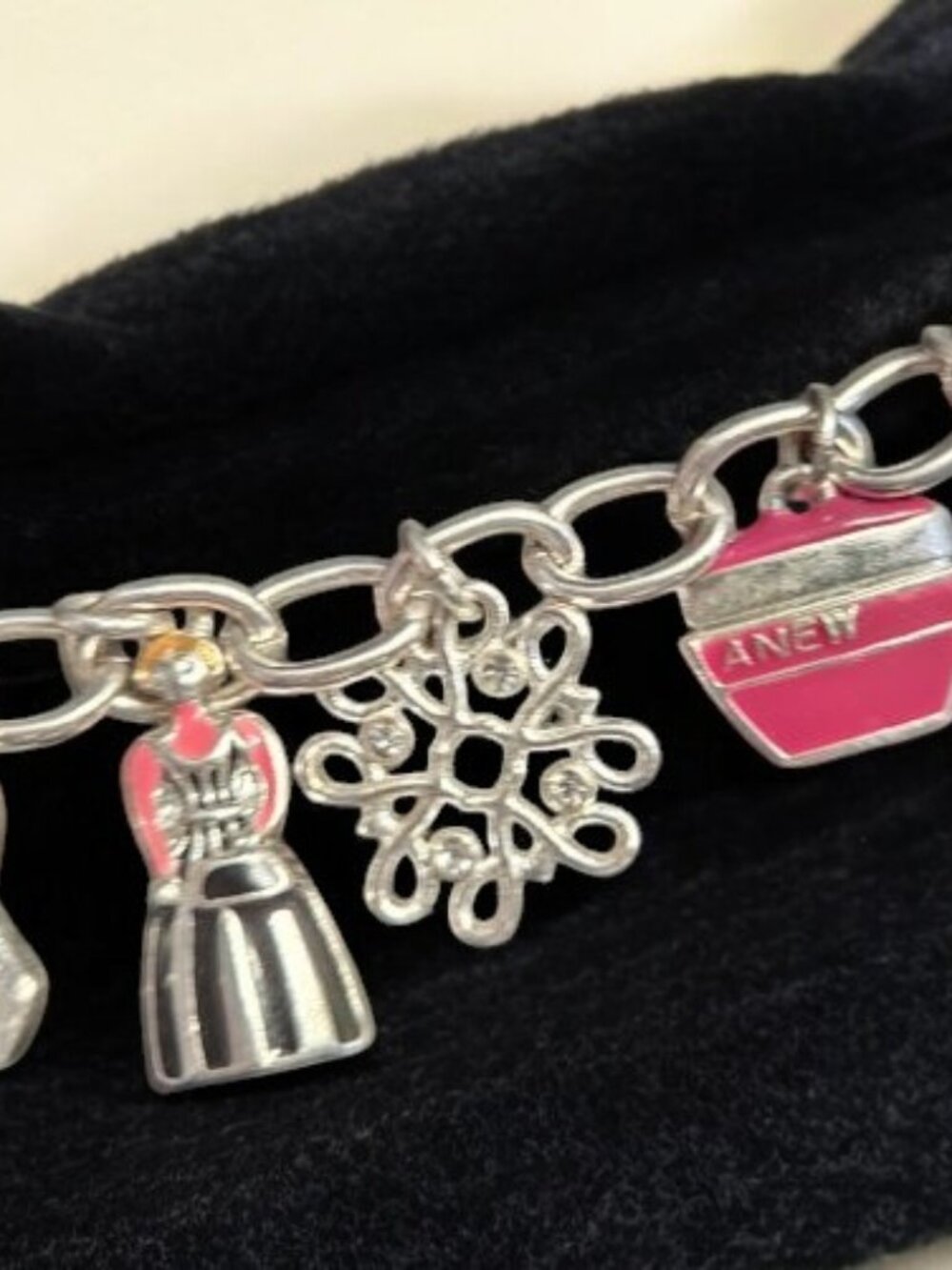 AVON Silver 125 Year Anniversary Charm Bracelet 11 Charms